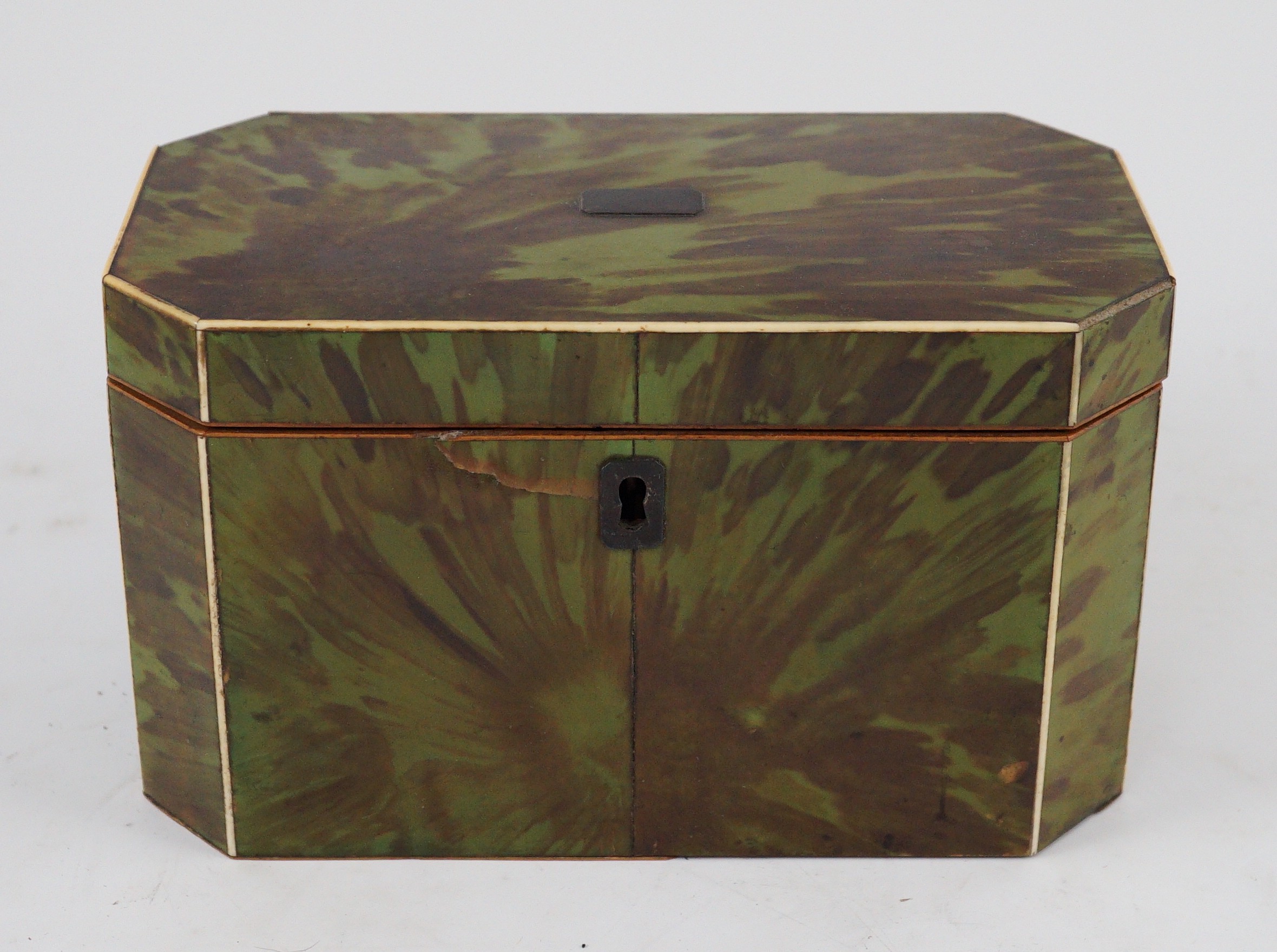 A George III green stained tortoiseshell and ivory octagonal tea caddy, 18.5cm wide 9.5cm deep 11cm high